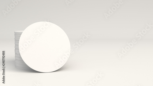 Mockup of blank white round beer coasters