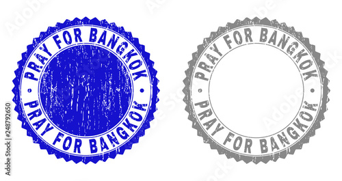 Grunge PRAY FOR BANGKOK stamp seals isolated on a white background. Rosette seals with grunge texture in blue and gray colors.