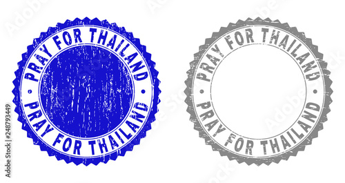 Grunge PRAY FOR THAILAND stamp seals isolated on a white background. Rosette seals with grunge texture in blue and grey colors.