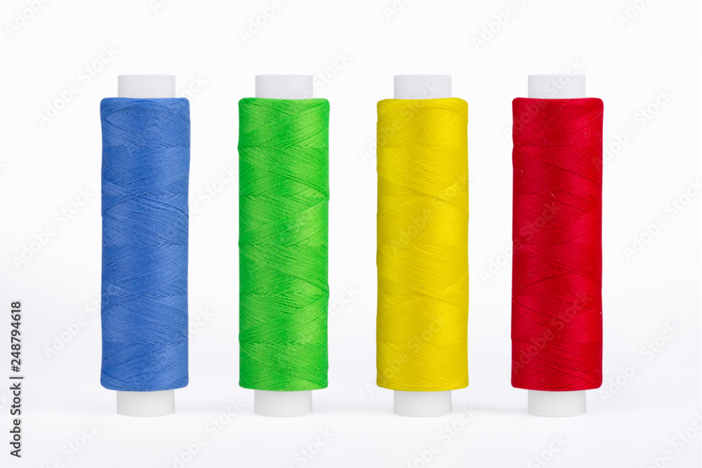 Set of sewing thread coils, miscellaneous colours, isolated on white Set of sewing thread coils, miscellaneous colours, isolated on white