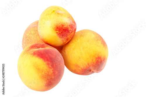Fresh peach fruits isolated on white background