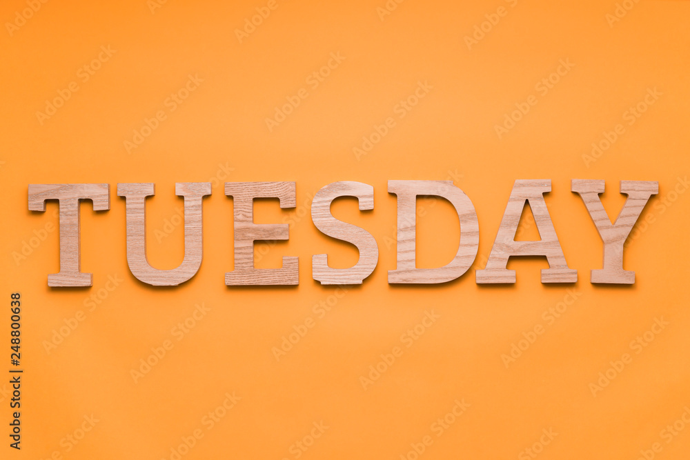 Alphabets day of the week over green background. Letterpress wood type printing blocks