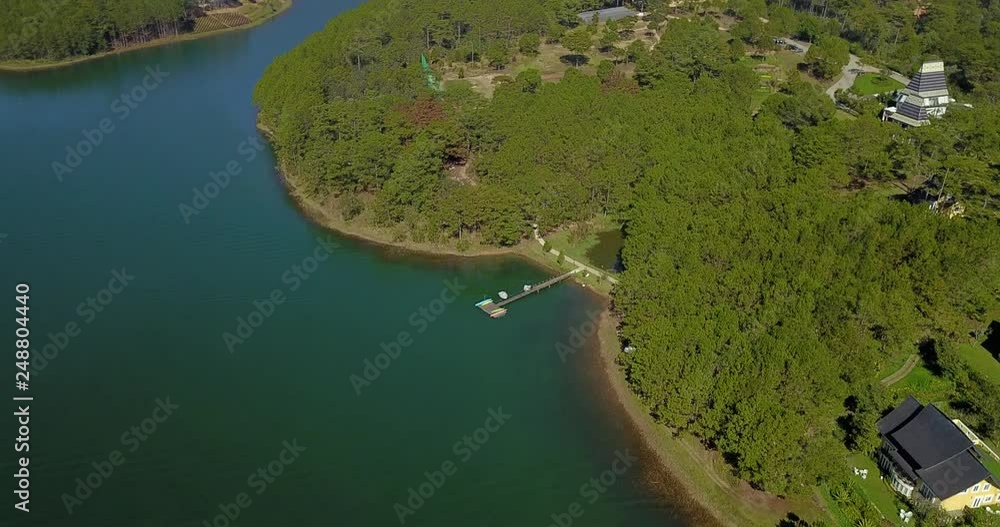 green pine forest in tuyen lam lake from aerial view green pine forest in tuyen lam lake from aerial view