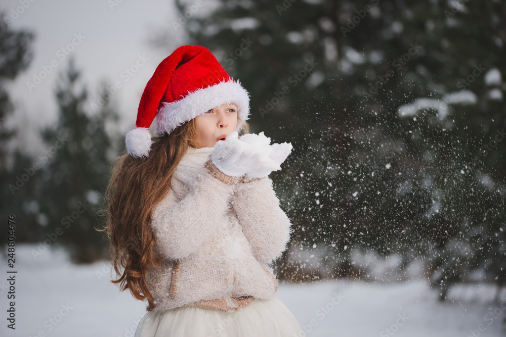 little happy beautiful girl in winter forest little happy beautiful girl in winter forest