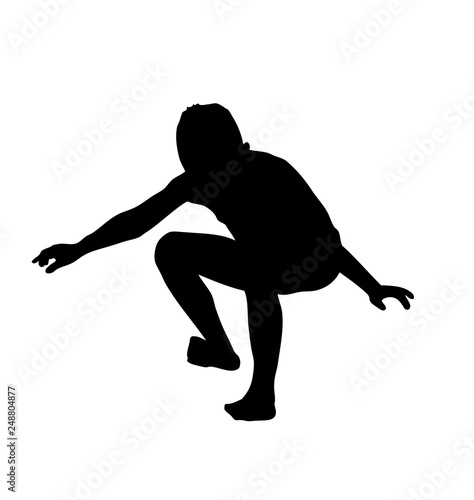 Silhouette of little a boy jumps