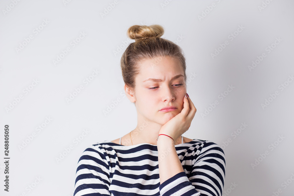 Young sad unhappy woman feel pain on her teeth isolated on white background, Young sad unhappy woman feel pain on her teeth isolated on white background,
