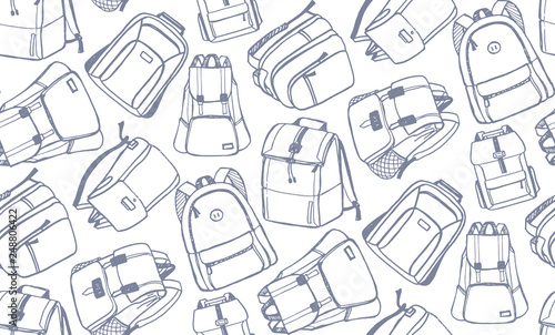 Hand drawn doodle backpack back to school pattern background