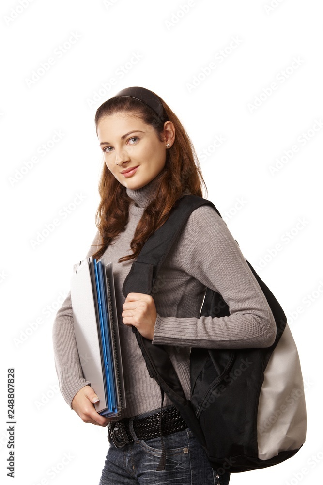 Happy highschool student girl with bag and folders Happy highschool student girl with bag and folders