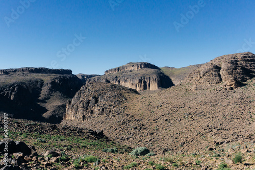 Morocco tourism: trekking man in mountains. Atlas mountains, Jebel Sakhro (Djebel Sahro), Ourzazate, Morocco