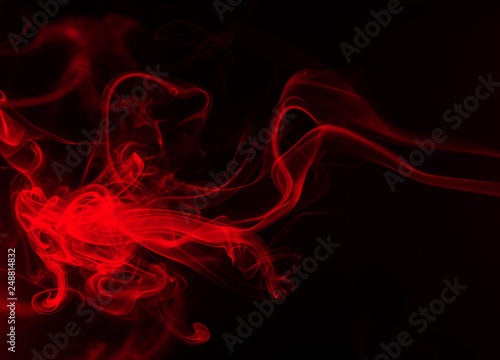 Fire of red smoke abstract on black background, darkness concept