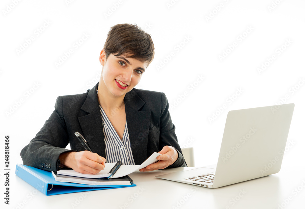 Portrait of happy attractive young businesswoman working on her laptop looking confident Portrait of happy attractive young businesswoman working on her laptop looking confident
