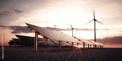 Modern and futuristic aesthetic black solar panels of large photovoltaic power station with wind turbines in background in warm sunset light. 3d rendering. photo