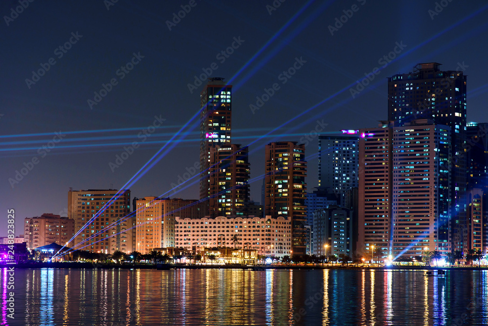 Obraz premium Sharjah modern skyline during light festival at night