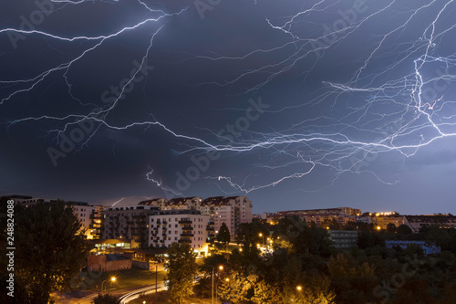 Dramatic lightning storm over housing estate 