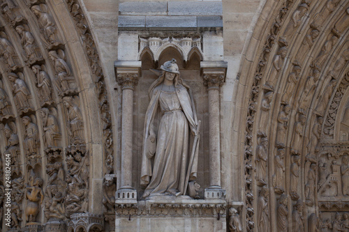 Fragment of Notre Dame Cathedral in Paris in France. Chimera on the left tower of the cathedral