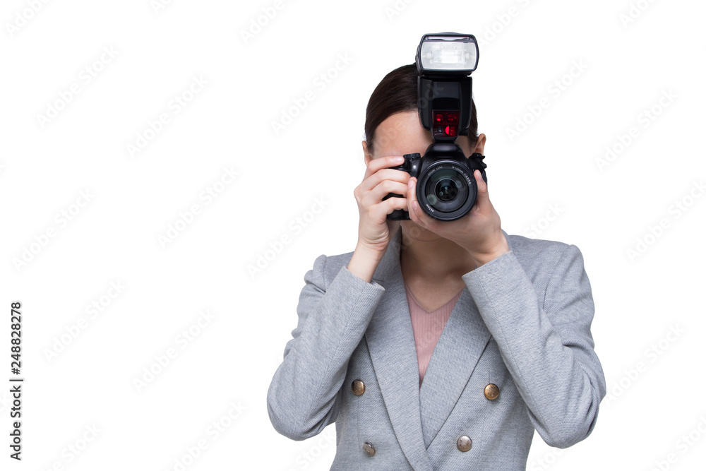 Asian Woman Photographer hold camera with external flash point to shoot subject, wear formal black suit. studio lighting white background isolated copy space, reporter journalist take photo celebrity Asian Woman Photographer hold camera with external flash point to shoot subject, wear formal black suit. studio lighting white background isolated copy space, reporter journalist take photo celebrity
