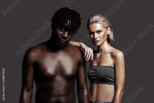 African-American model standing near his appealing colleague