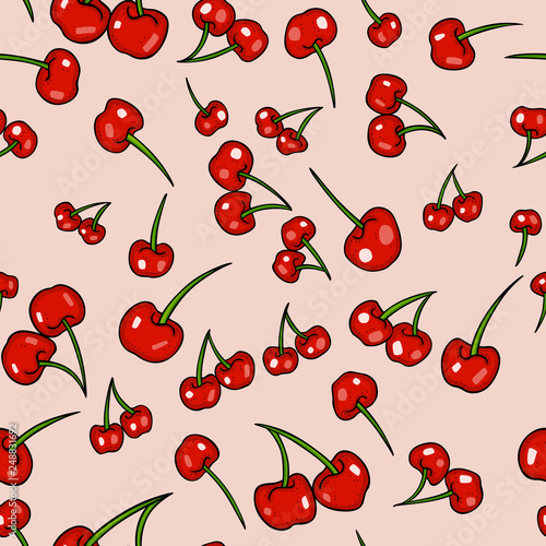 Red cherries on pink background