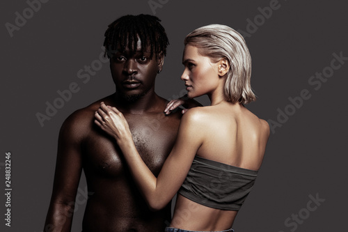 African-American man with dreadlocks posing with girlfriend