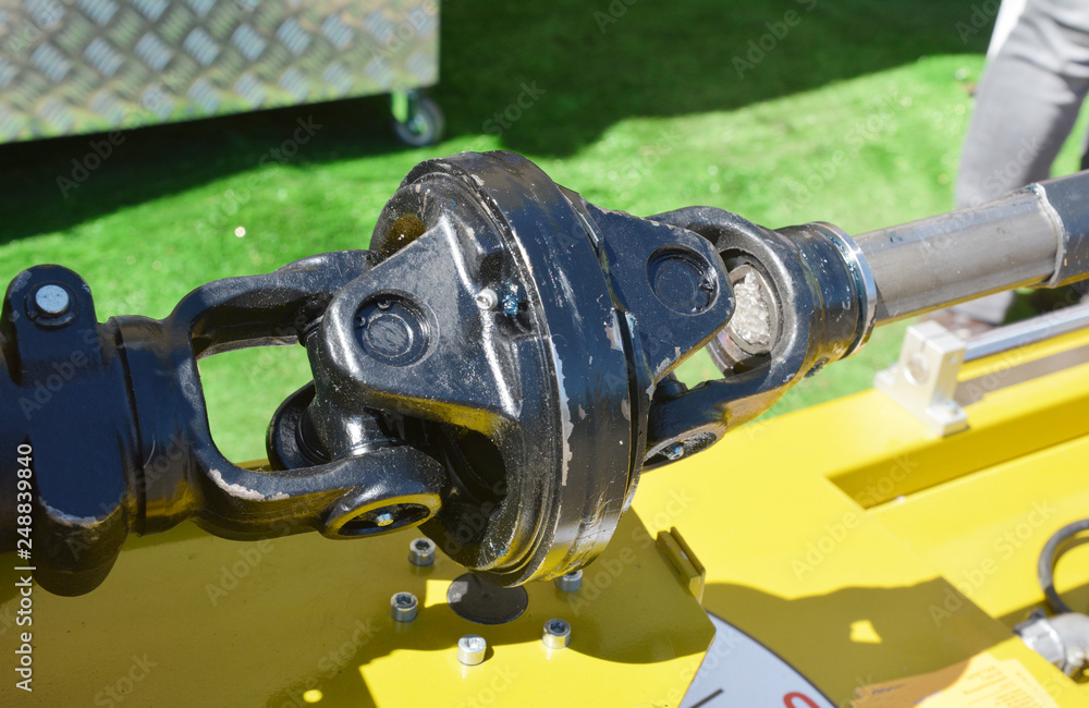 A universal joint (universal coupling, Ujoint, Cardan joint, Spicer or