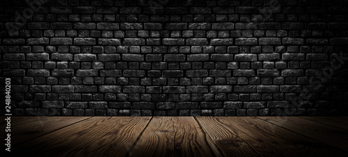 Photo background of an empty black room, a cellar, lit by a searchlight