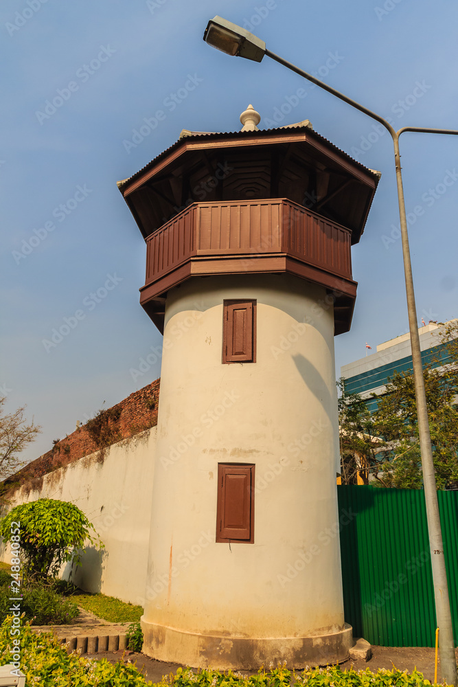 Old prison guard tower that constructed with brick, wood and red roof tiles. A watchtower on the corner of a prison wall that  named 