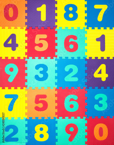 Colorful Baby Mat. Rubber foam pad for children playing. Colorful background ackground with digits