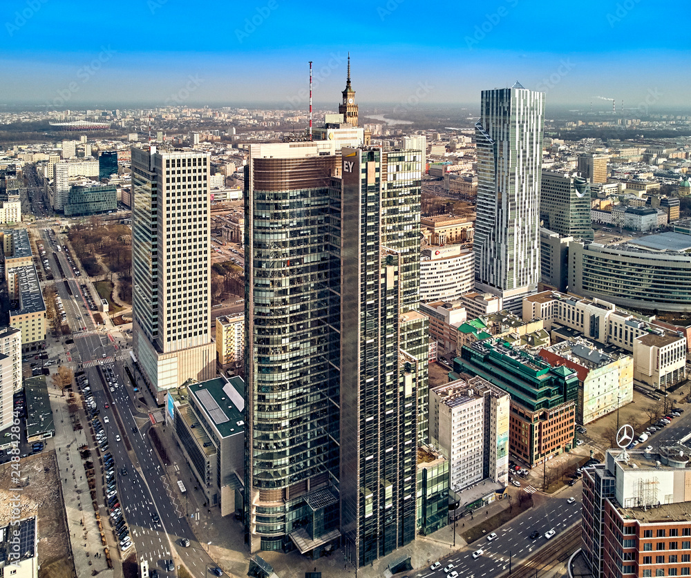 Naklejka premium WARSAW, POLAND - FEBRUARY 10, 2019: Beautiful panoramic aerial drone view to panorama cityscape of Warsaw modern City, PKiN and