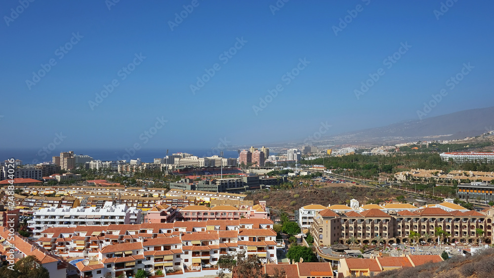 Elevated views of the vast Las Americas resort from Montaña Chayofita expanded over two municipalities once known as fishing villages, Las Americas, Tenerife, Canary Islands, Spain