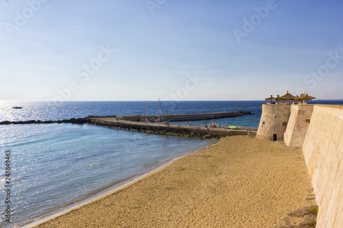 Gallipoli, a beautiful beach in the city. Puglia, Italy photo