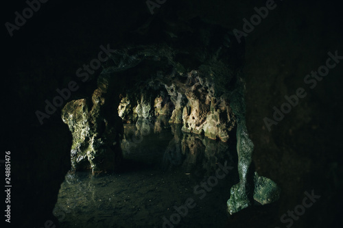 Inside view of a natural underground cave with flooded water in the city of Sintra in Portugal.