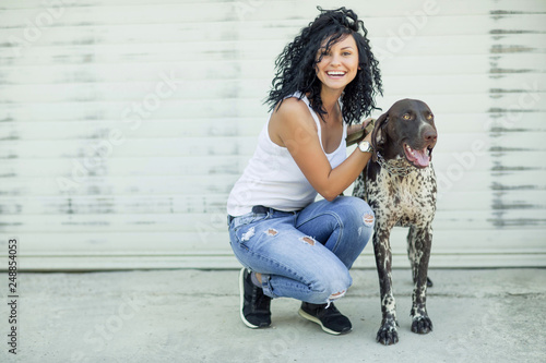 Beautiful woman with a dog 