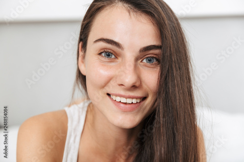 Close up of a beautiful young woman relaxing Free Download Close up of a beautiful young woman relaxing - GFXLoad