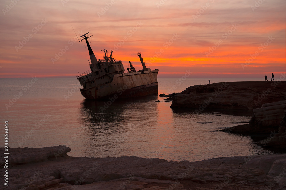Beautiful seascape and shipwreck. Abandoned ship Edro III at sunset near the Paphos, Cyprus. Beautiful seascape and shipwreck. Abandoned ship Edro III at sunset near the Paphos, Cyprus.