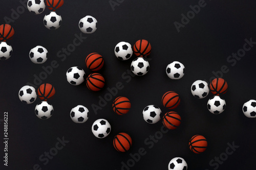 Balls basketball and football background. Top view. Wallpaper.