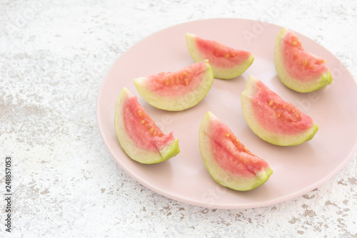 Pink guava on white background 
