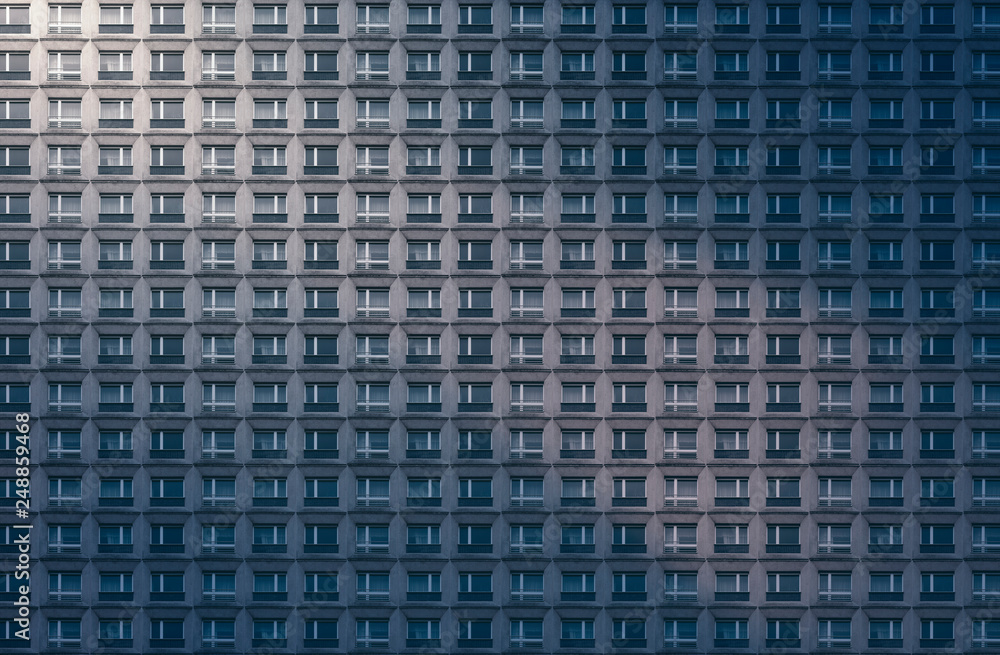 architectural pattern, concrete facade of a miserable skyscraper