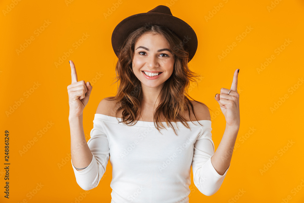 Portrait of a cheerful young woman wearing white shirt Portrait of a cheerful young woman wearing white shirt