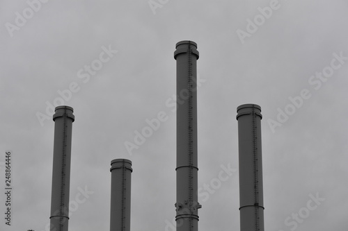 Four chimneys of a coal-fired power station.