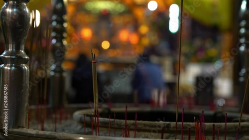 4K, Incense burning in Taiwan first temple of heaven. God of Jade Emperor, deities in Taoist faith. People praying in temples with incenses sticks. Taiwanese folk religion for make wish-Dan photo