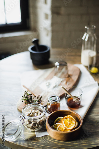 still life kitchen table, wooden board, vase