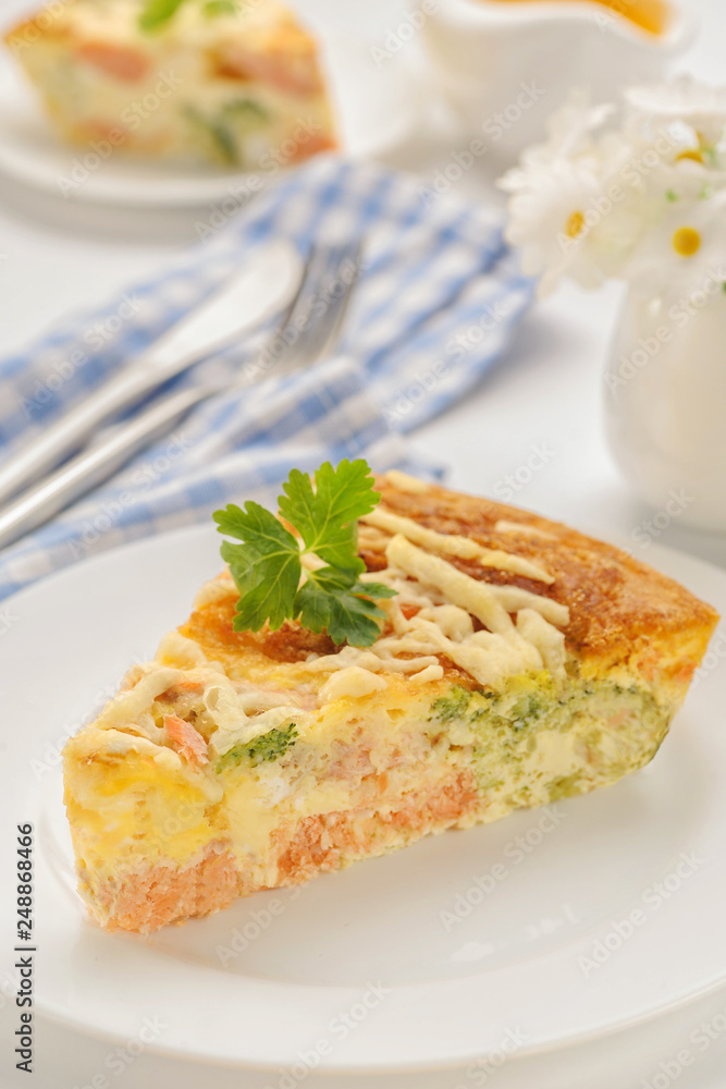 Homemade frittata a piece in the cut. High key. Homemade frittata a piece in the cut. High key.