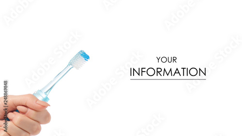 Travel blue toothbrush in hand pattern on white background isolation