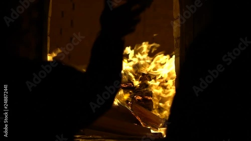 Slow Motion of people burning joss paper in ancient asian temple Taiwan. Temples are a place of worship. Taiwanese folk religion for make wish. People praying buddha with incenses sticks-Dan