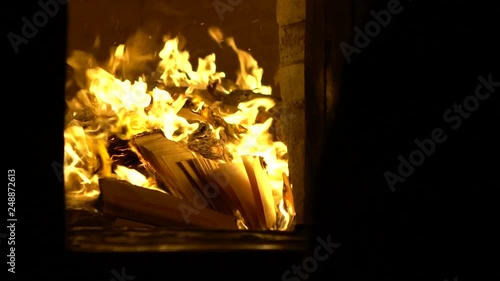 Slow Motion of people burning joss paper in ancient asian temple Taiwan. Burn the ghost money is a tradition in honor of the ancestors for the spirit of the deceased has good things in afterlife-Dan