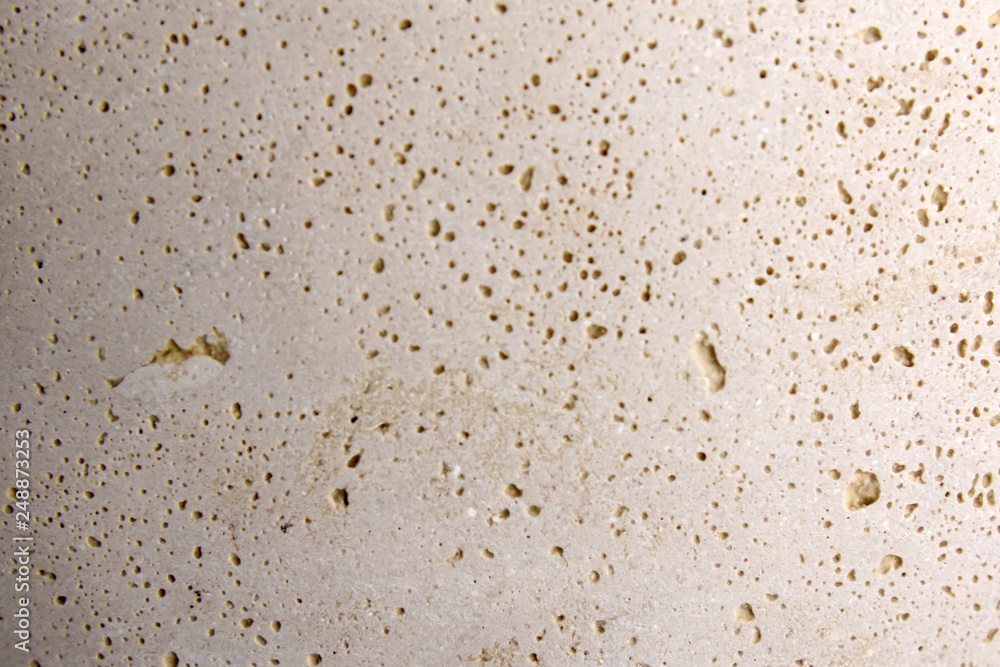 Relief background of beige sandstone Relief background of beige sandstone
