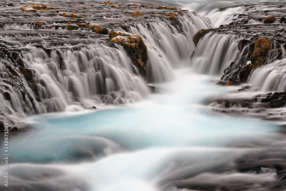 The cascading Bruarfoss Waterfall in Iceland