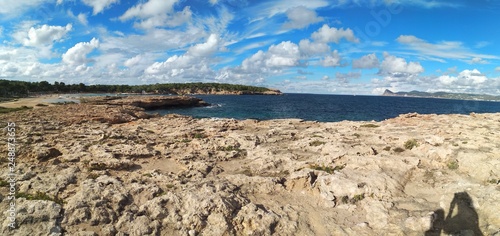 famous beach of Cala Bassa in ibiza, pitiusa island of the balearics photo