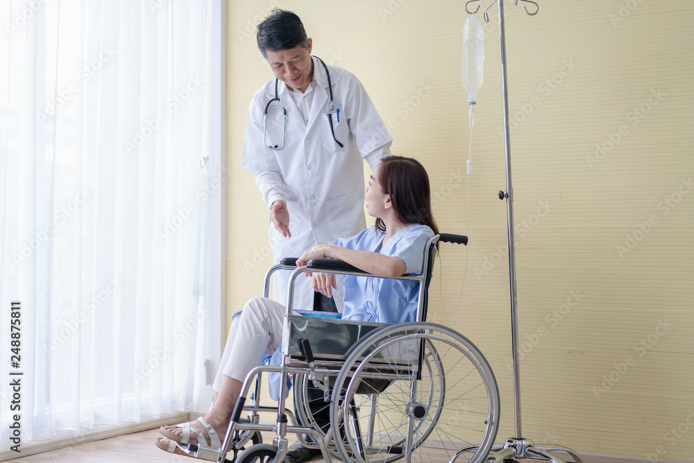 Smiling doctor with patient in medical office. Smiling doctor with patient in medical office.