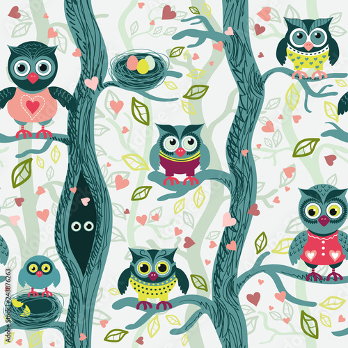 Owls in spring seamless pattern in Scandinavian style. Owls on a tree in a spring forest. Birds waiting for love. Vector background for fabric,   textile, wallpaper, posters, gift wrapping paper, napk photo